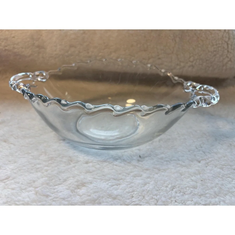 vintage clear glass item is a handled bowl from the Century pattern, mfct by